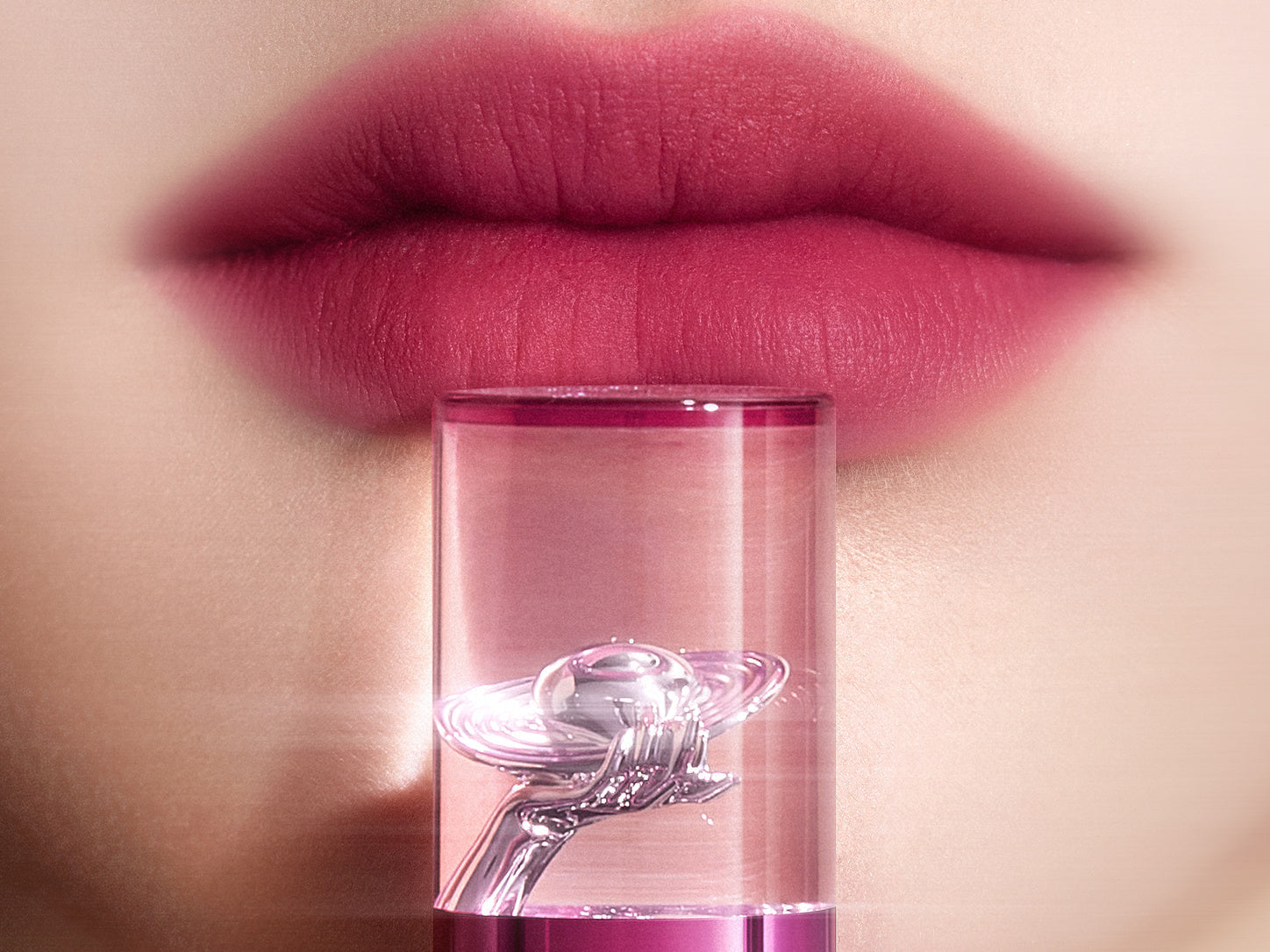 Altera Blurring Lip Tint with applicator beside softly blurred lips with an even velvet matte finish